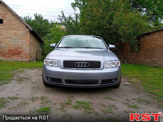 Серый Ауди А4, объемом двигателя 2.4 л и пробегом 210 тыс. км за 5000 $, фото 1 на Automoto.ua