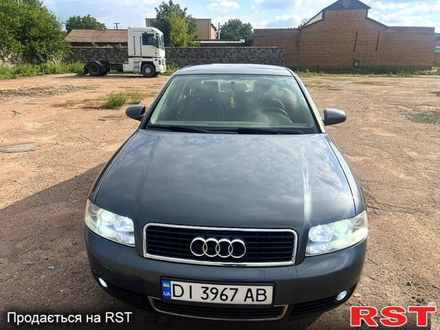 Серый Ауди А4, объемом двигателя 2 л и пробегом 210 тыс. км за 4600 $, фото 1 на Automoto.ua