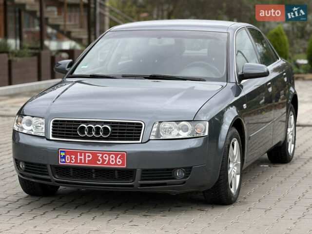 Серый Ауди А4, объемом двигателя 2 л и пробегом 220 тыс. км за 5950 $, фото 1 на Automoto.ua