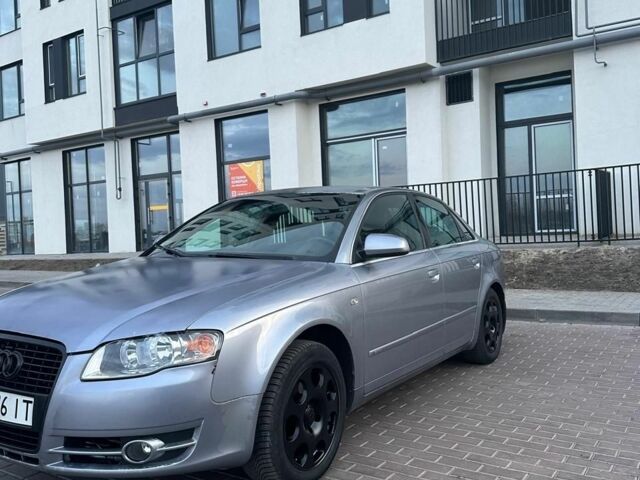 Серый Ауди А4, объемом двигателя 2 л и пробегом 300 тыс. км за 3399 $, фото 1 на Automoto.ua