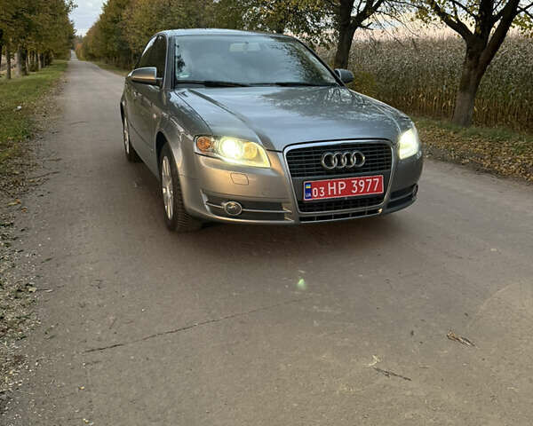 Серый Ауди А4, объемом двигателя 2 л и пробегом 200 тыс. км за 6500 $, фото 1 на Automoto.ua