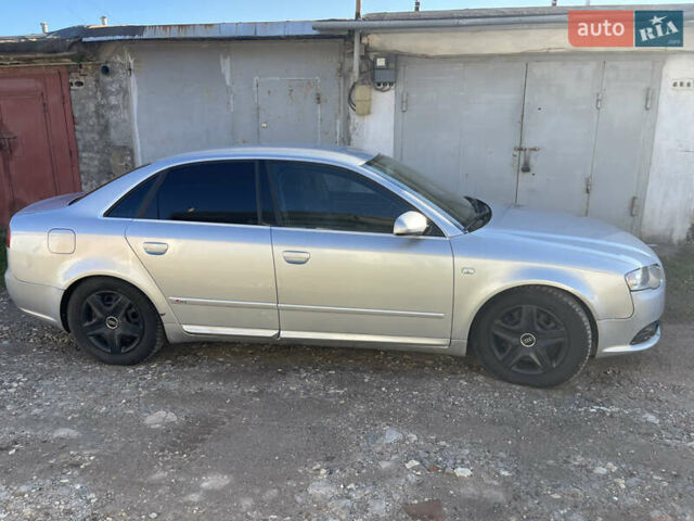 Серый Ауди А4, объемом двигателя 2 л и пробегом 385 тыс. км за 6150 $, фото 1 на Automoto.ua