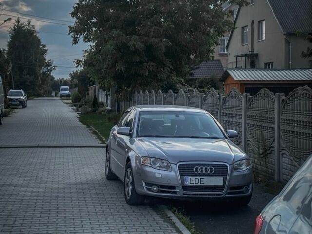 Сірий Ауді А4, об'ємом двигуна 2 л та пробігом 313 тис. км за 4000 $, фото 1 на Automoto.ua