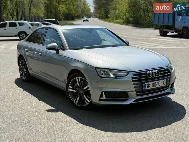 Серый Ауди А4, объемом двигателя 2 л и пробегом 65 тыс. км за 16500 $, фото 1 на Automoto.ua