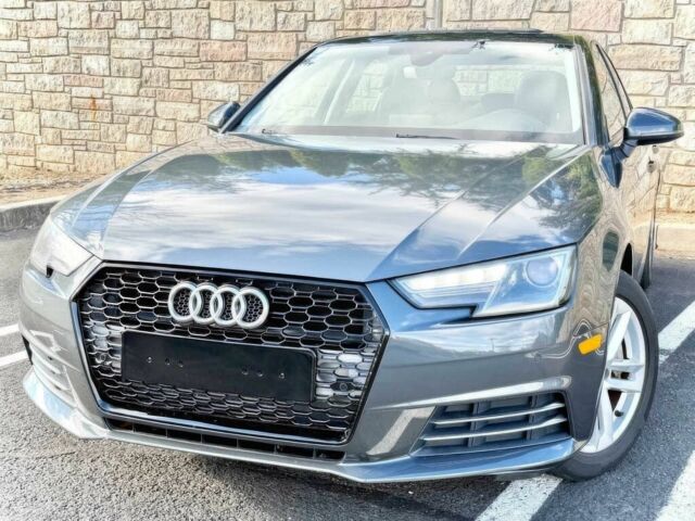 Серый Ауди А4, объемом двигателя 2 л и пробегом 55 тыс. км за 13500 $, фото 1 на Automoto.ua