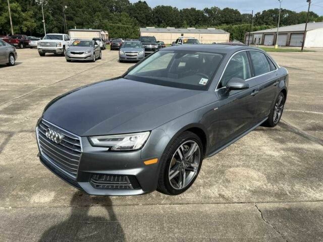 Серый Ауди А4, объемом двигателя 2 л и пробегом 142 тыс. км за 16000 $, фото 1 на Automoto.ua