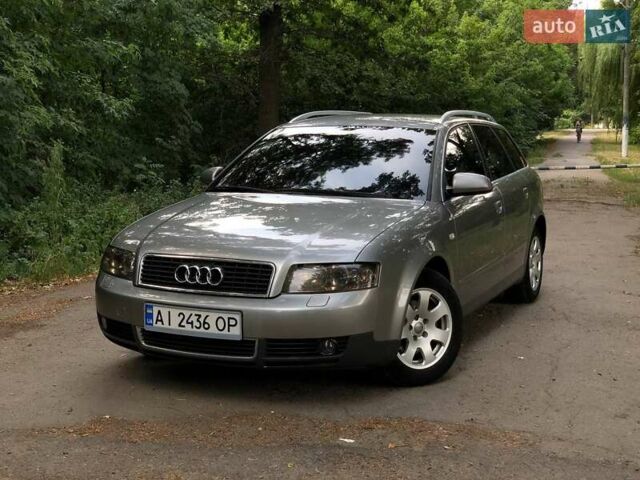 Сірий Ауді А4, об'ємом двигуна 2 л та пробігом 234 тис. км за 5300 $, фото 1 на Automoto.ua