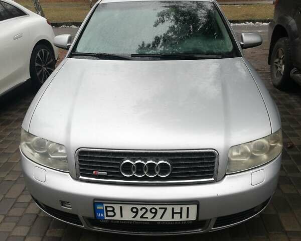 Серый Ауди А4, объемом двигателя 1.6 л и пробегом 222 тыс. км за 6000 $, фото 1 на Automoto.ua