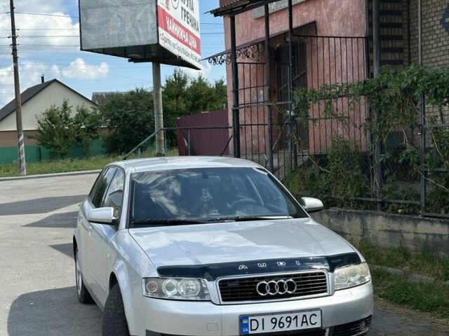 Серый Ауди А4, объемом двигателя 2 л и пробегом 250 тыс. км за 3600 $, фото 1 на Automoto.ua