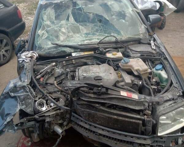 Серый Ауди А4, объемом двигателя 1.8 л и пробегом 150 тыс. км за 1600 $, фото 1 на Automoto.ua