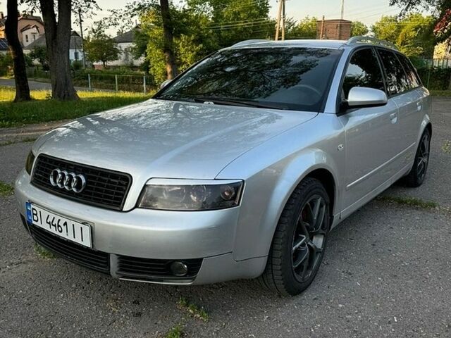 Сірий Ауді А4, об'ємом двигуна 1.6 л та пробігом 336 тис. км за 5000 $, фото 1 на Automoto.ua