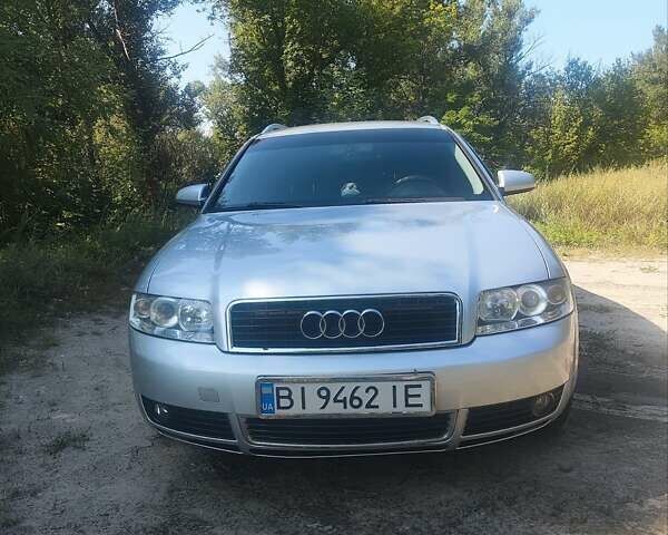 Серый Ауди А4, объемом двигателя 2 л и пробегом 305 тыс. км за 5500 $, фото 1 на Automoto.ua