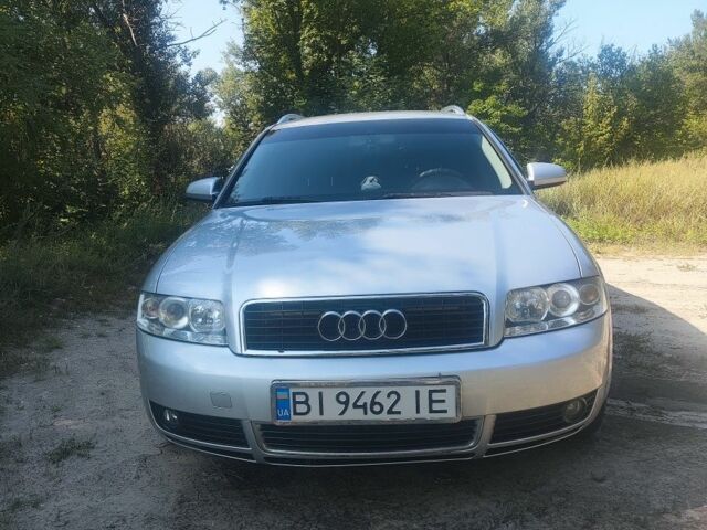 Серый Ауди А4, объемом двигателя 2 л и пробегом 305 тыс. км за 5300 $, фото 1 на Automoto.ua