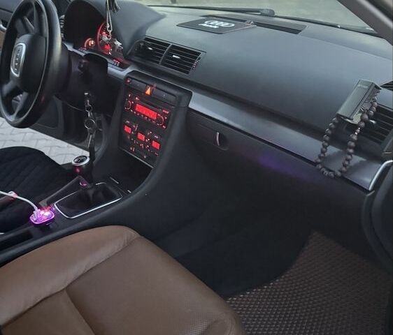 Серый Ауди А4, объемом двигателя 2 л и пробегом 265 тыс. км за 7019 $, фото 1 на Automoto.ua