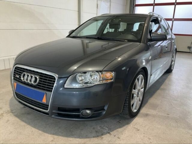 Серый Ауди А4, объемом двигателя 2 л и пробегом 245 тыс. км за 6500 $, фото 1 на Automoto.ua