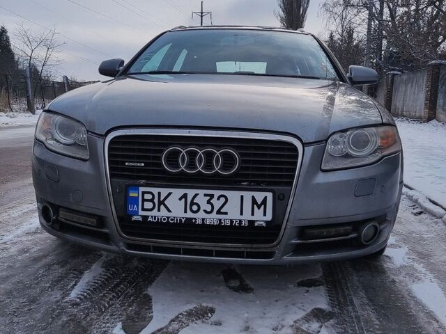 Серый Ауди А4, объемом двигателя 2 л и пробегом 310 тыс. км за 6500 $, фото 1 на Automoto.ua