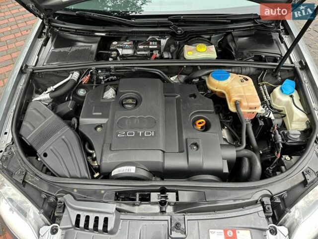 Сірий Ауді А4, об'ємом двигуна 2 л та пробігом 394 тис. км за 5900 $, фото 1 на Automoto.ua