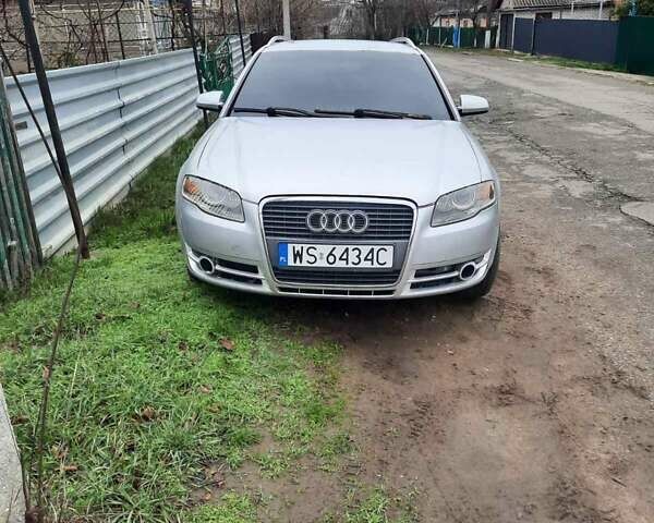 Серый Ауди А4, объемом двигателя 2 л и пробегом 320 тыс. км за 3100 $, фото 1 на Automoto.ua