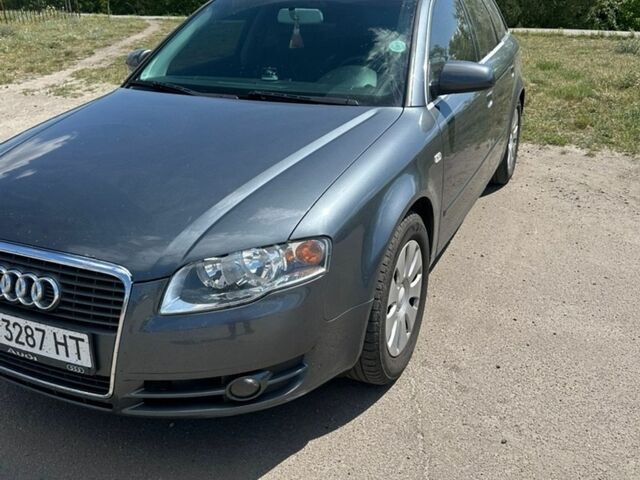 Серый Ауди А4, объемом двигателя 2 л и пробегом 313 тыс. км за 5900 $, фото 1 на Automoto.ua
