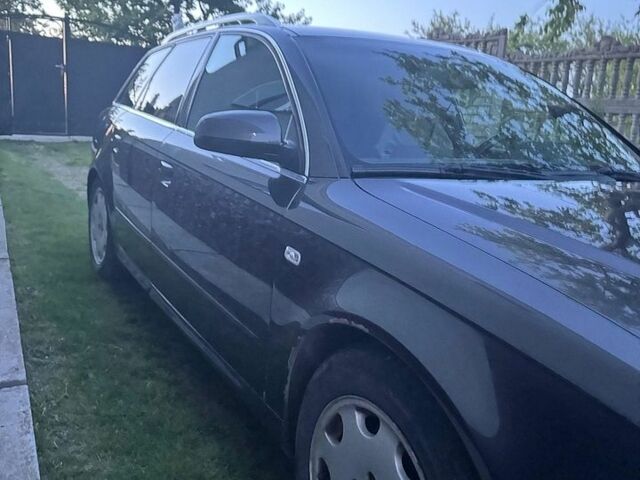 Сірий Ауді А4, об'ємом двигуна 2 л та пробігом 211 тис. км за 5999 $, фото 1 на Automoto.ua