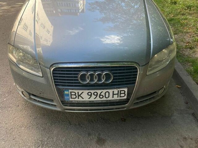 Сірий Ауді А4, об'ємом двигуна 2 л та пробігом 291 тис. км за 7599 $, фото 1 на Automoto.ua