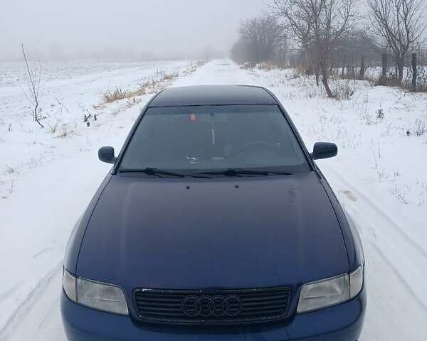 Синий Ауди А4, объемом двигателя 1.6 л и пробегом 443 тыс. км за 2300 $, фото 1 на Automoto.ua