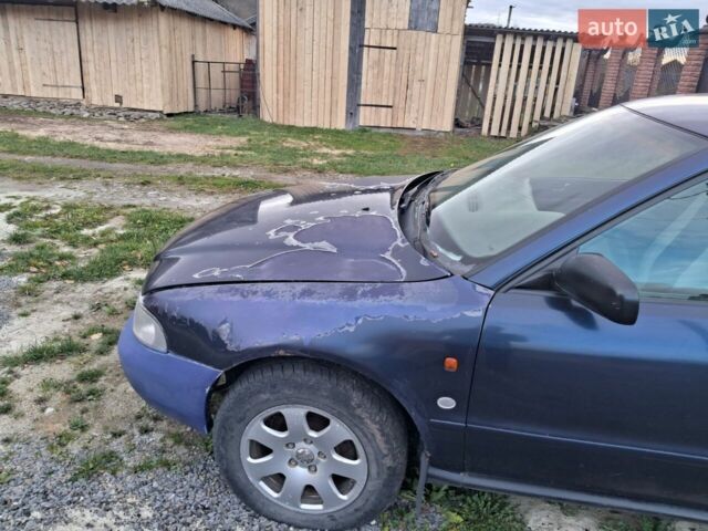 Синий Ауди А4, объемом двигателя 1.6 л и пробегом 290 тыс. км за 700 $, фото 1 на Automoto.ua