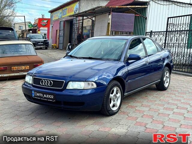 Синий Ауди А4, объемом двигателя 1.6 л и пробегом 290 тыс. км за 3899 $, фото 1 на Automoto.ua