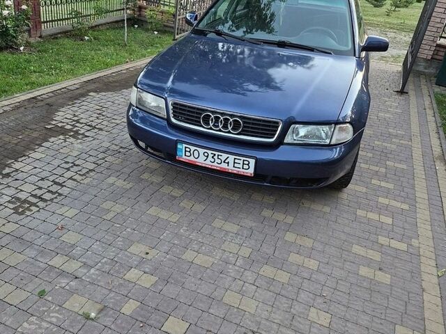 Синий Ауди А4, объемом двигателя 1.6 л и пробегом 333 тыс. км за 1450 $, фото 1 на Automoto.ua