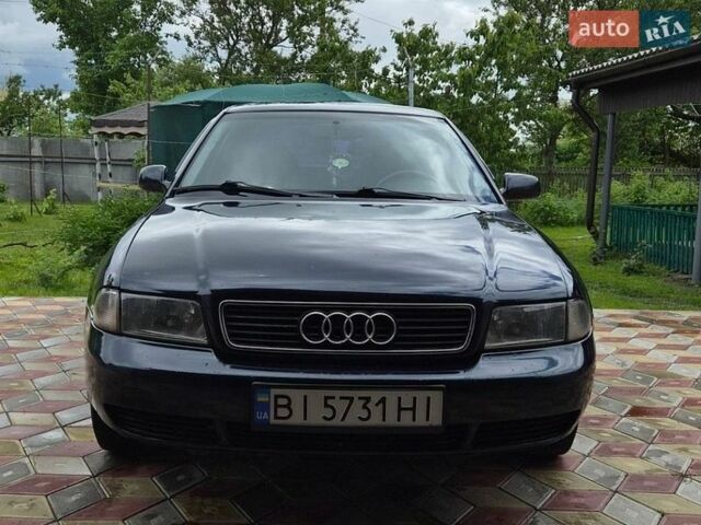 Синий Ауди А4, объемом двигателя 1.8 л и пробегом 407 тыс. км за 2700 $, фото 1 на Automoto.ua