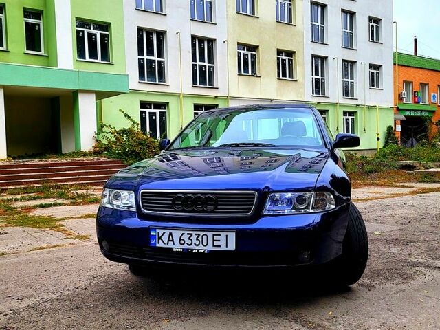 Синий Ауди А4, объемом двигателя 1.6 л и пробегом 306 тыс. км за 4650 $, фото 1 на Automoto.ua