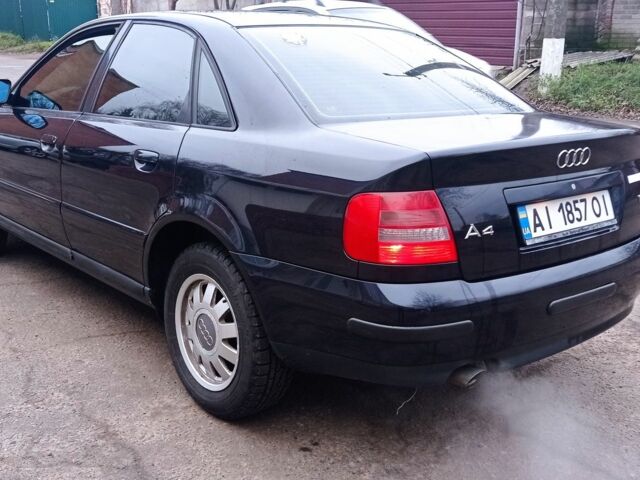 Синий Ауди А4, объемом двигателя 1.6 л и пробегом 200 тыс. км за 1650 $, фото 1 на Automoto.ua
