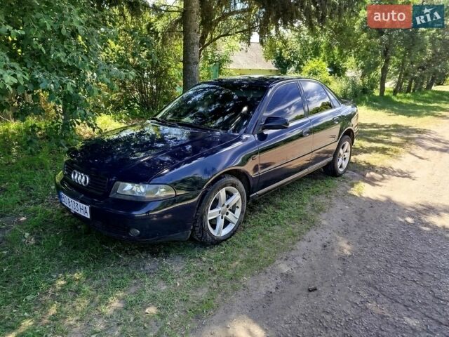 Синий Ауди А4, объемом двигателя 1.6 л и пробегом 310 тыс. км за 4000 $, фото 1 на Automoto.ua