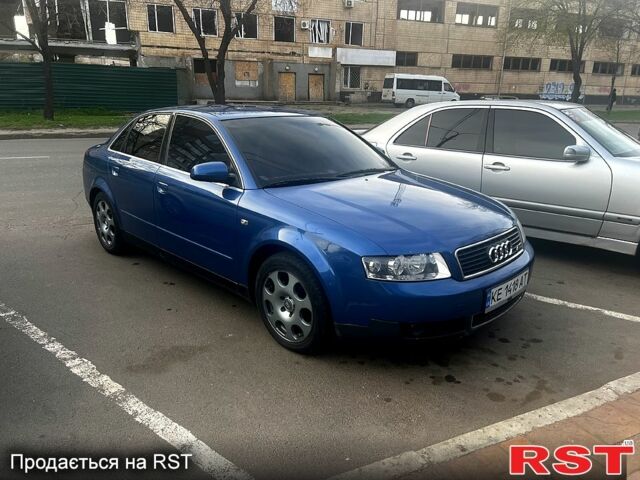 Синій Ауді А4, об'ємом двигуна 2 л та пробігом 316 тис. км за 5500 $, фото 1 на Automoto.ua