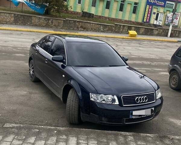 Синій Ауді А4, об'ємом двигуна 2 л та пробігом 201 тис. км за 5300 $, фото 1 на Automoto.ua