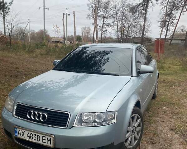 Синий Ауди А4, объемом двигателя 1.6 л и пробегом 230 тыс. км за 5700 $, фото 1 на Automoto.ua