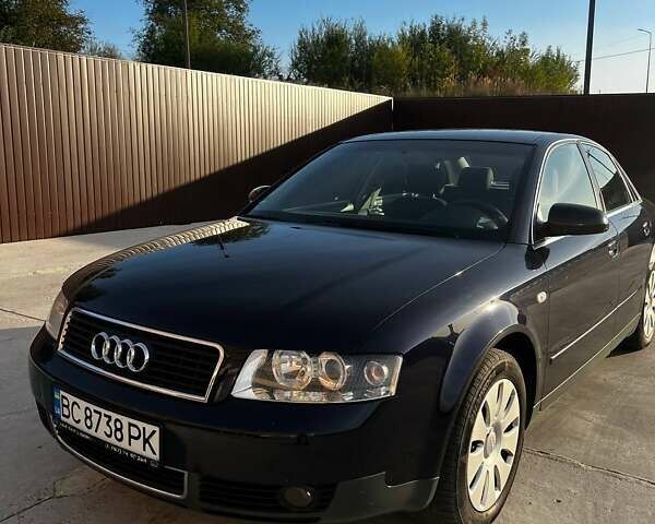 Синій Ауді А4, об'ємом двигуна 1.6 л та пробігом 211 тис. км за 6000 $, фото 1 на Automoto.ua