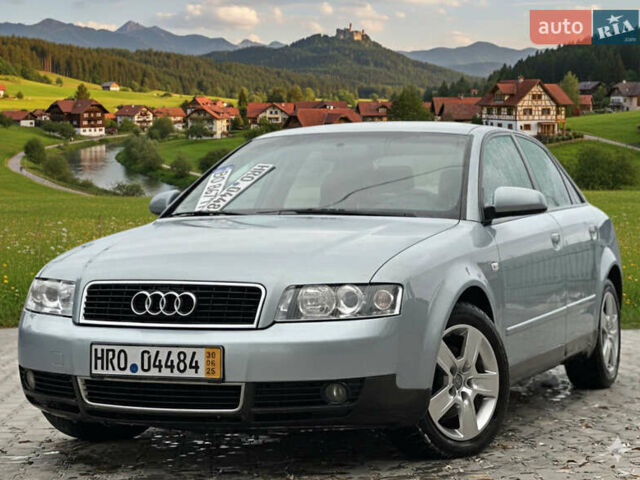 Синій Ауді А4, об'ємом двигуна 2 л та пробігом 238 тис. км за 4999 $, фото 1 на Automoto.ua