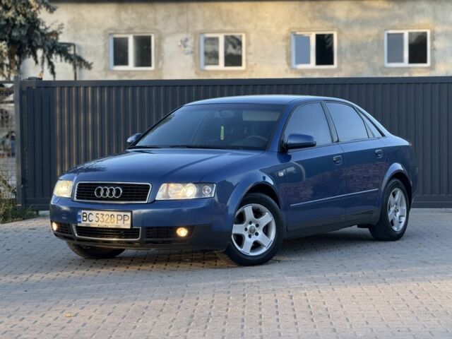 Синий Ауди А4, объемом двигателя 2 л и пробегом 245 тыс. км за 4300 $, фото 1 на Automoto.ua