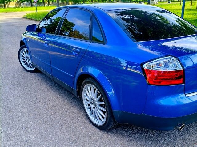 Синий Ауди А4, объемом двигателя 1.6 л и пробегом 265 тыс. км за 5300 $, фото 1 на Automoto.ua