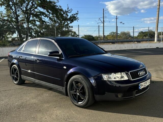 Синий Ауди А4, объемом двигателя 1.8 л и пробегом 293 тыс. км за 5900 $, фото 1 на Automoto.ua