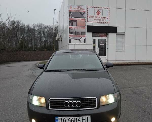 Синий Ауди А4, объемом двигателя 1.6 л и пробегом 241 тыс. км за 5000 $, фото 1 на Automoto.ua