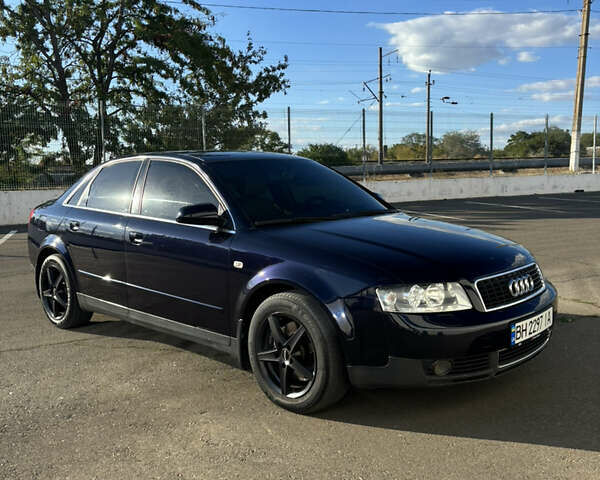 Синий Ауди А4, объемом двигателя 1.8 л и пробегом 293 тыс. км за 5900 $, фото 1 на Automoto.ua