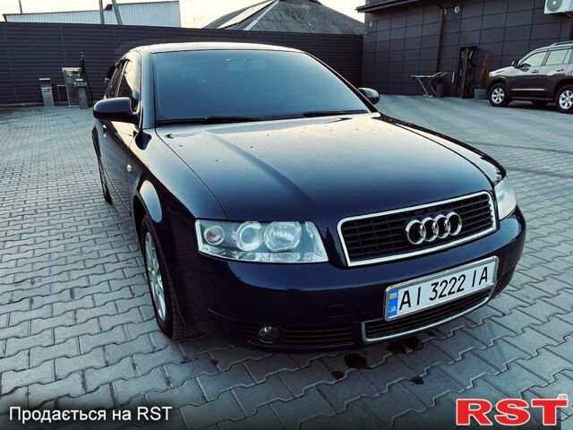 Синий Ауди А4, объемом двигателя 1.6 л и пробегом 326 тыс. км за 5800 $, фото 1 на Automoto.ua