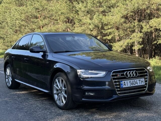 Синій Ауді А4, об'ємом двигуна 2 л та пробігом 133 тис. км за 13568 $, фото 1 на Automoto.ua