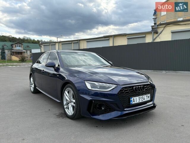 Синій Ауді А4, об'ємом двигуна 2 л та пробігом 100 тис. км за 28500 $, фото 1 на Automoto.ua