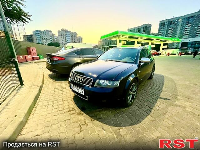 Синий Ауди А4, объемом двигателя 2.5 л и пробегом 398 тыс. км за 6000 $, фото 1 на Automoto.ua