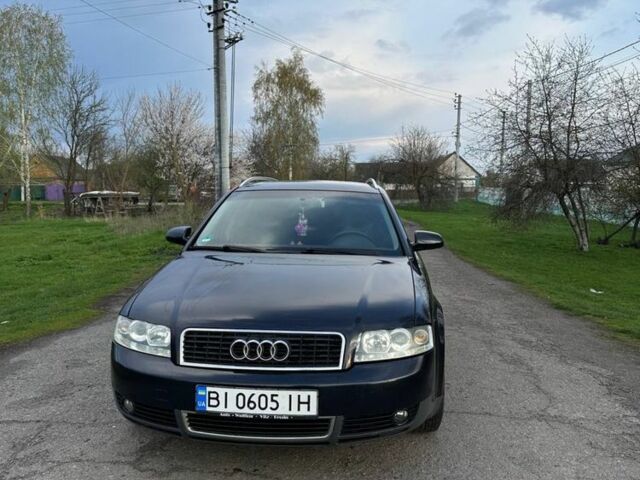 Синий Ауди А4, объемом двигателя 1.6 л и пробегом 302 тыс. км за 4550 $, фото 1 на Automoto.ua
