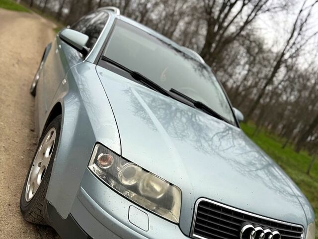 Синий Ауди А4, объемом двигателя 2.5 л и пробегом 360 тыс. км за 5000 $, фото 1 на Automoto.ua