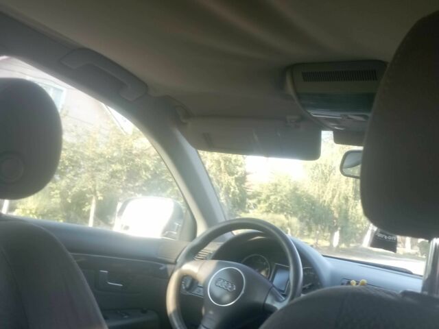 Синий Ауди А4, объемом двигателя 1.6 л и пробегом 315 тыс. км за 2800 $, фото 1 на Automoto.ua